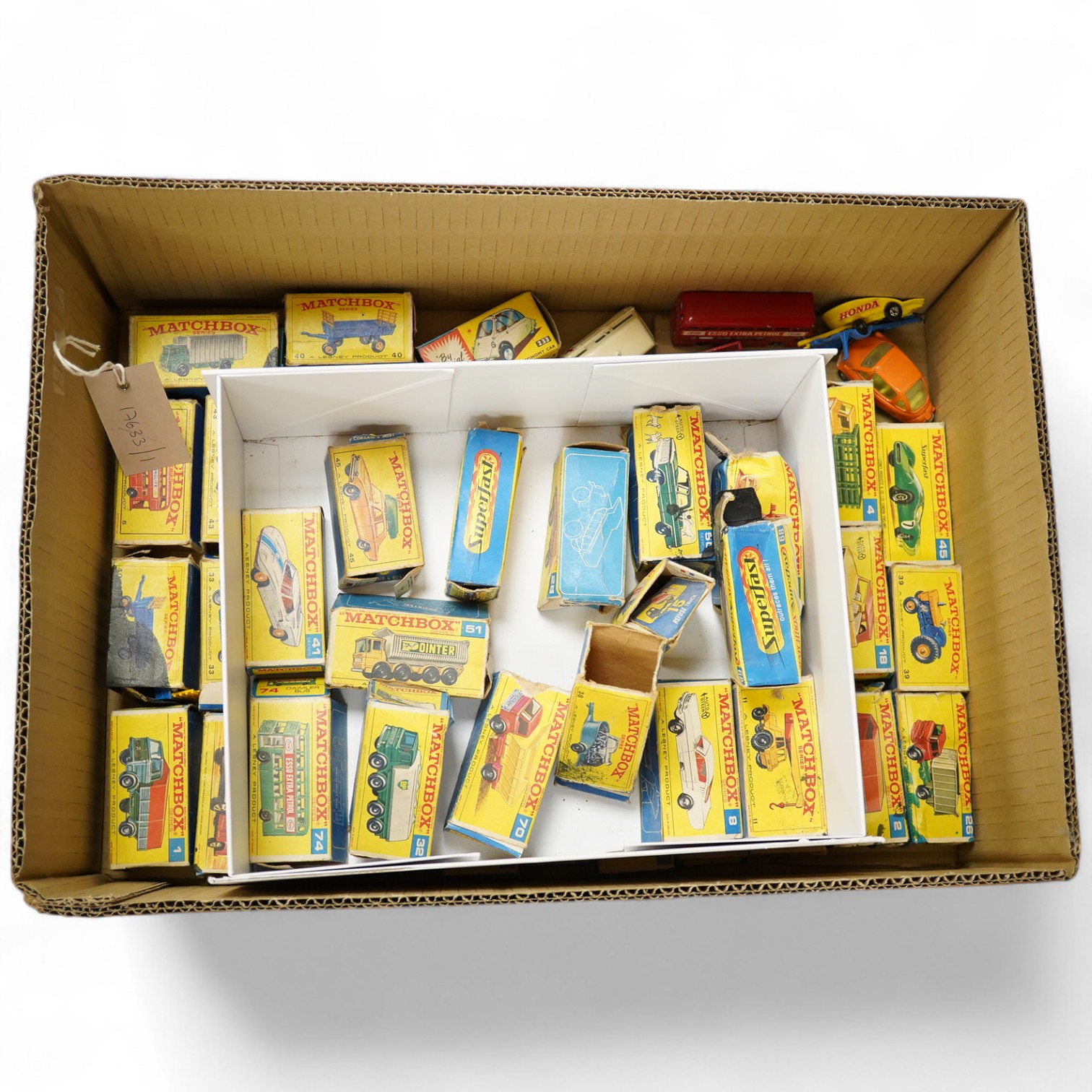 Thirty-four 1970s Matchbox Series vehicles in the remains of their boxes, together with three unboxed vehicles and fifteen empty boxes, plus a boxed Corgi Toys Heinkel (233). Condition - poor to fair, boxes badly creased